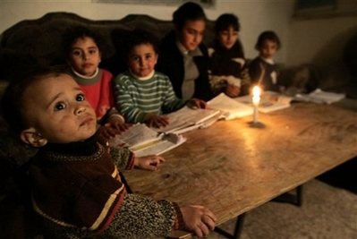 Gazan electricity by candlelight