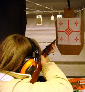 Meryl shoots a rifle