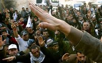 Hamas followers give the Nazi salute